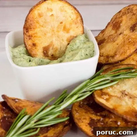 Rosemary potato chips: you can't get this flavor in a bag of store-bought chips! Dunk these crispy chips in a dip of fresh herb aioli for even more flavor. #ProgressiveEats