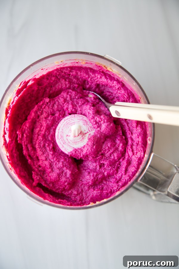 Roasted Beet Hummus Recipe — Vibrant Vegan Dip for Parties 4 beet hummus in a bowl