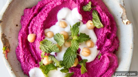 Roasted Beet Hummus Recipe — Vibrant Vegan Dip for Parties 7 beet hummus in a bowl