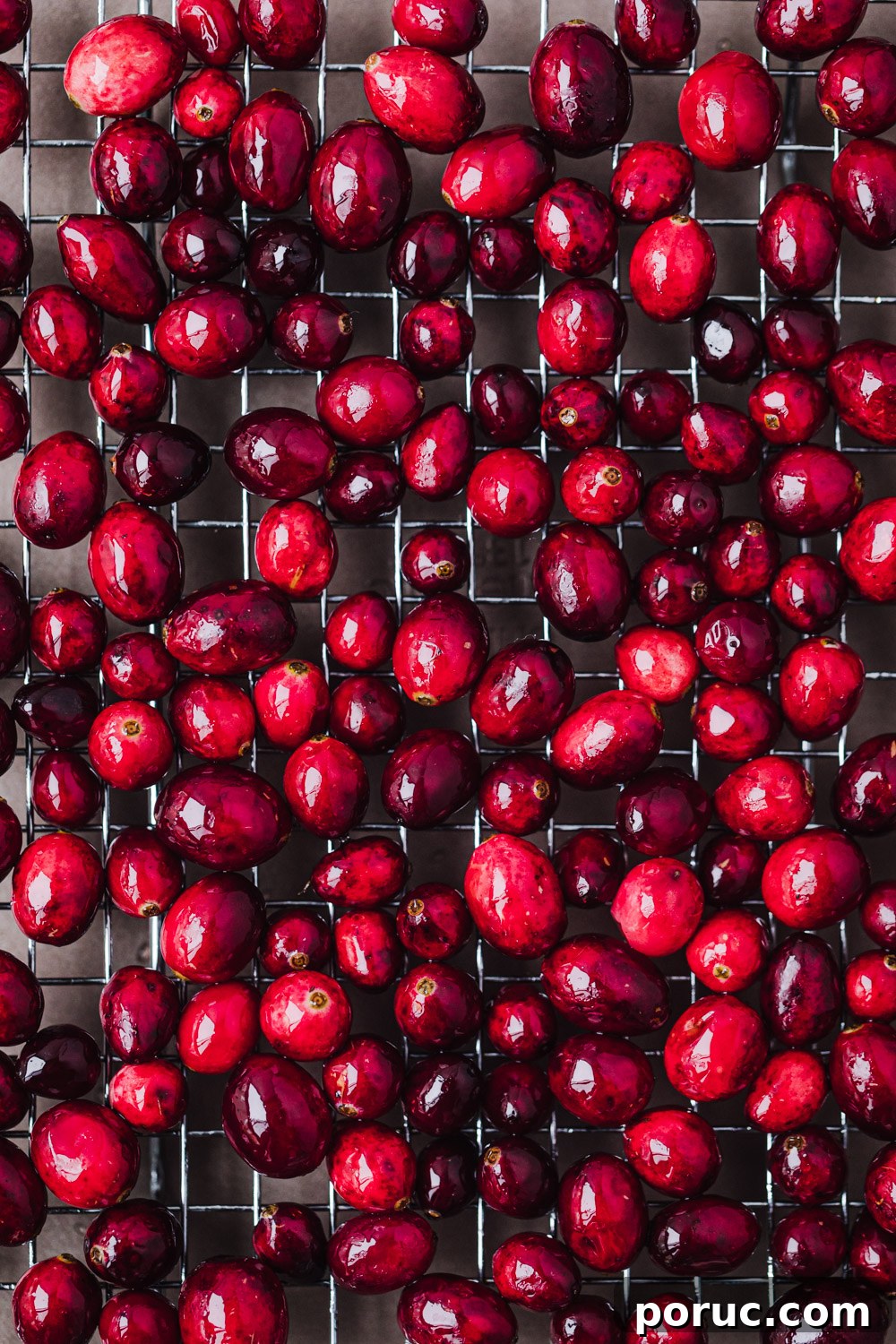 cranberries drying on a wire rack
