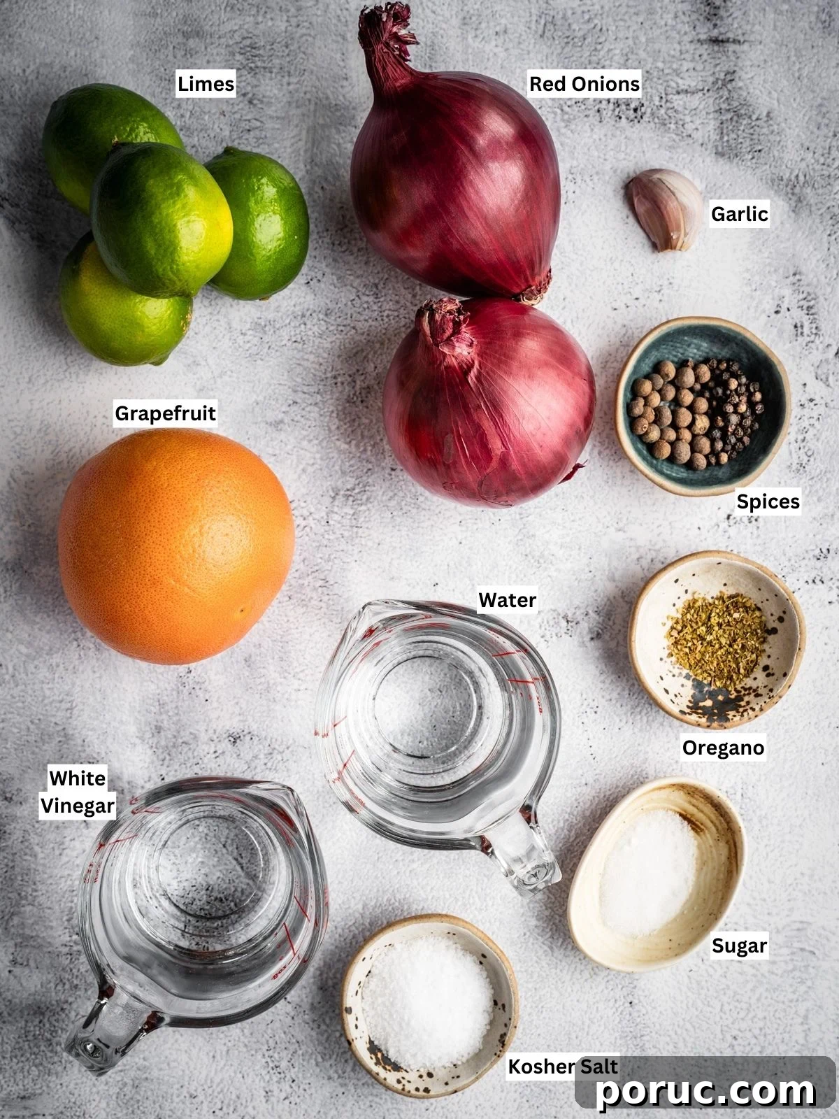 Yucatan-Style Mexican Pickled Red Onions for Tacos & Salads 4 Mexican pickled onions recipe ingredients with individual labels on a board.