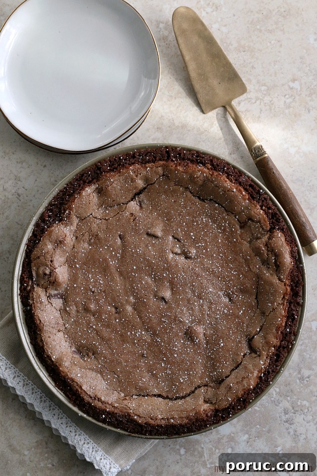 Gluten-Free Double Chocolate Fudge Pie Recipe 6 Gluten-free Fudge Pie with Chocolate Crust and powdered sugar sprinkled