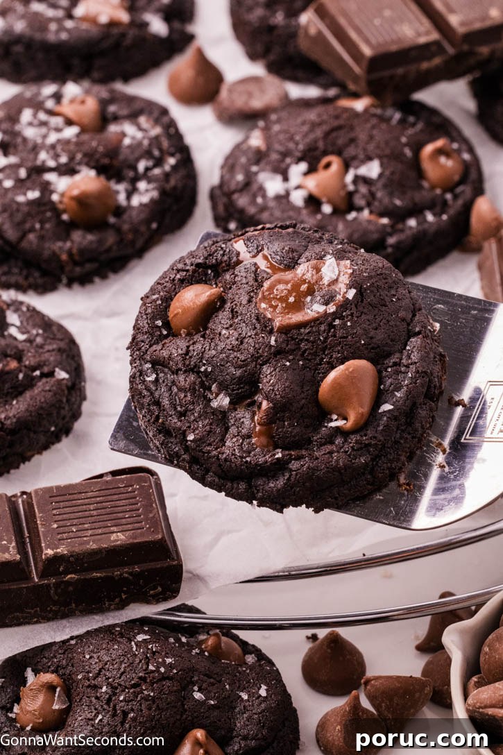spatula scooping Triple Chocolate Cookies