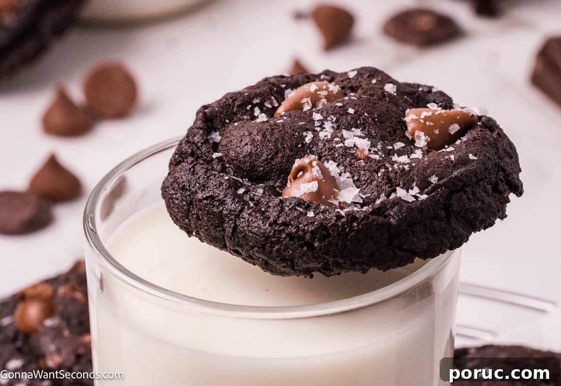 Triple Chocolate Cookies on top of a glass of milk
