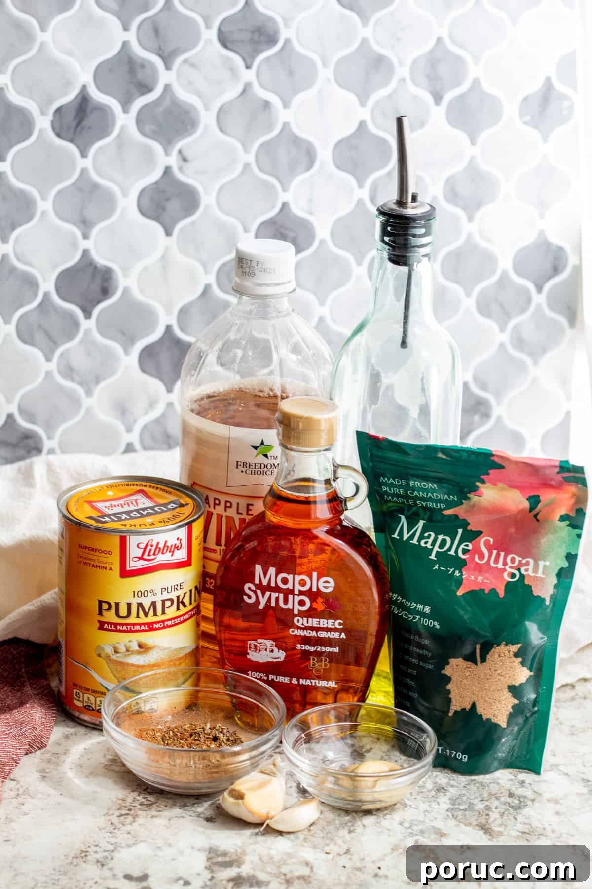 Ingredients laid out on white table in glass bowls and packaging.
