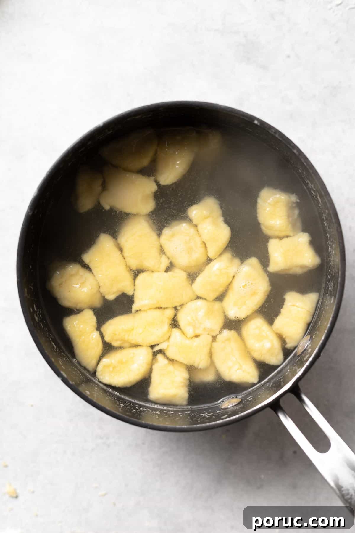 Boiling ricotta gnocchi ricotta gnocchi being boiled in a stock pot.