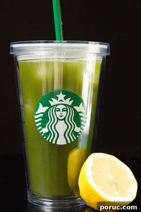 Starbucks-Style Matcha Lemonade Recipe You Can Make at Home 3 Starbucks Matcha Lemonade in a grande tumbler cup on a black background