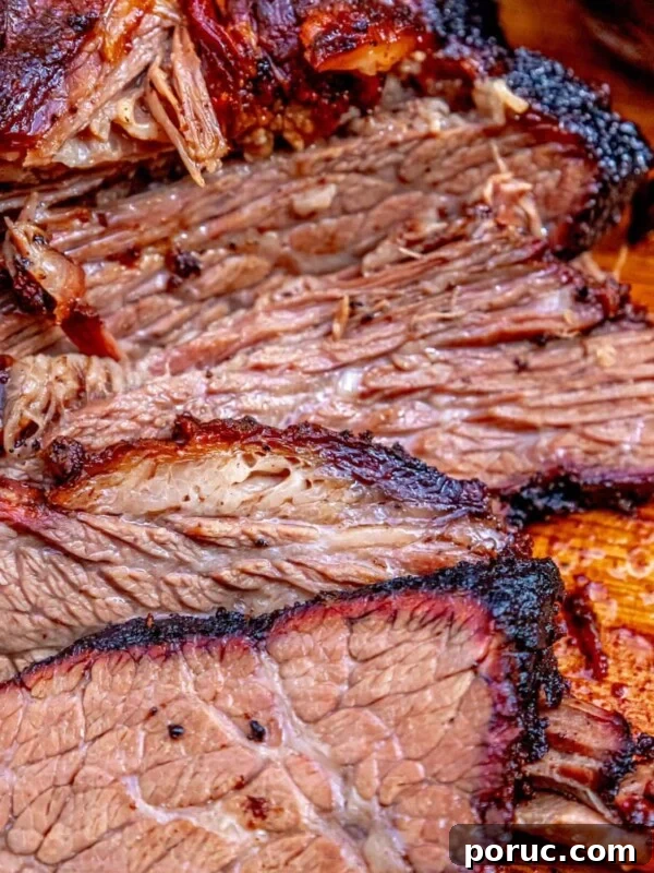 Grilled Corn on the Cob: 3 Quick Methods in 20 Minutes 10 picture of smoked brisket on a wooden cutting board
