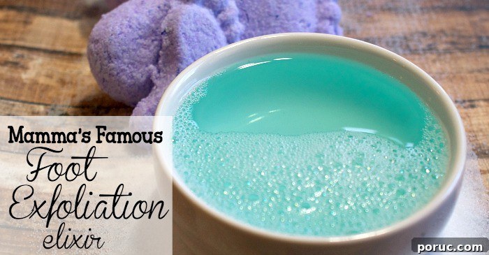 Mamma’s Famous Foot Exfoliation Elixir — Natural Foot Peel Recipe 4 A bowl of vibrant blue foaming liquid next to a purple exfoliating scrub, showcasing a homemade foot exfoliation elixir on a wooden surface.