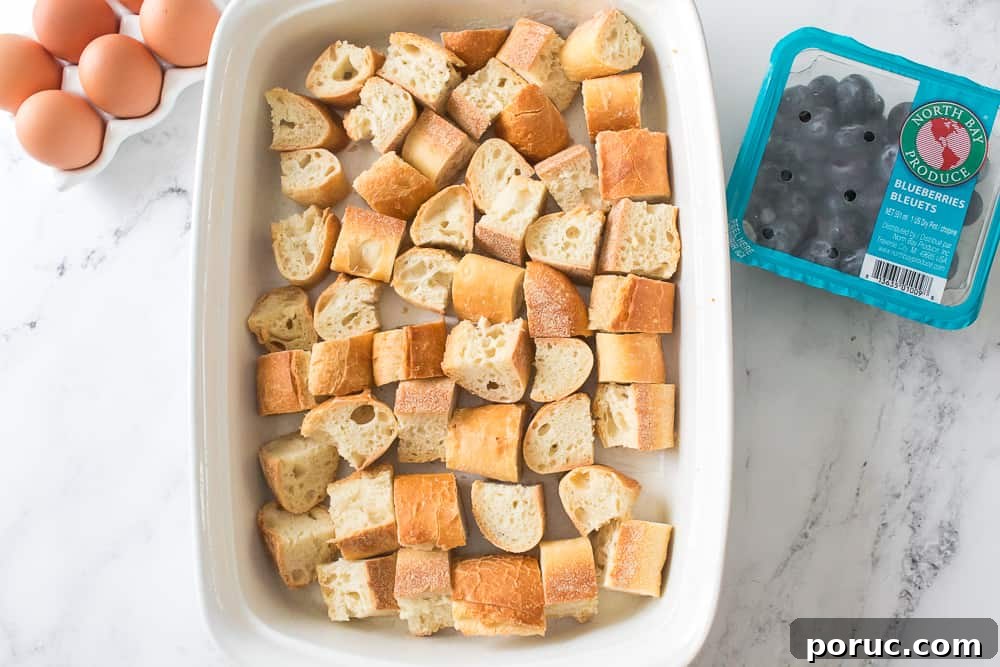 Blueberry French Toast Casserole Recipe for Brunch or Holidays 6 eggs, bread in casserole dish and North Bay Produce blueberries in packaging