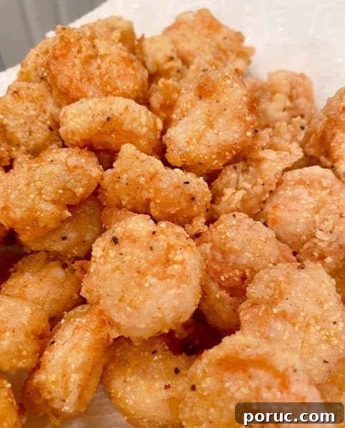 Crispy Shrimp Po' Boy Sandwich Recipe for Classic New Orleans Flavor 9 fried shrimp draining on paper towel