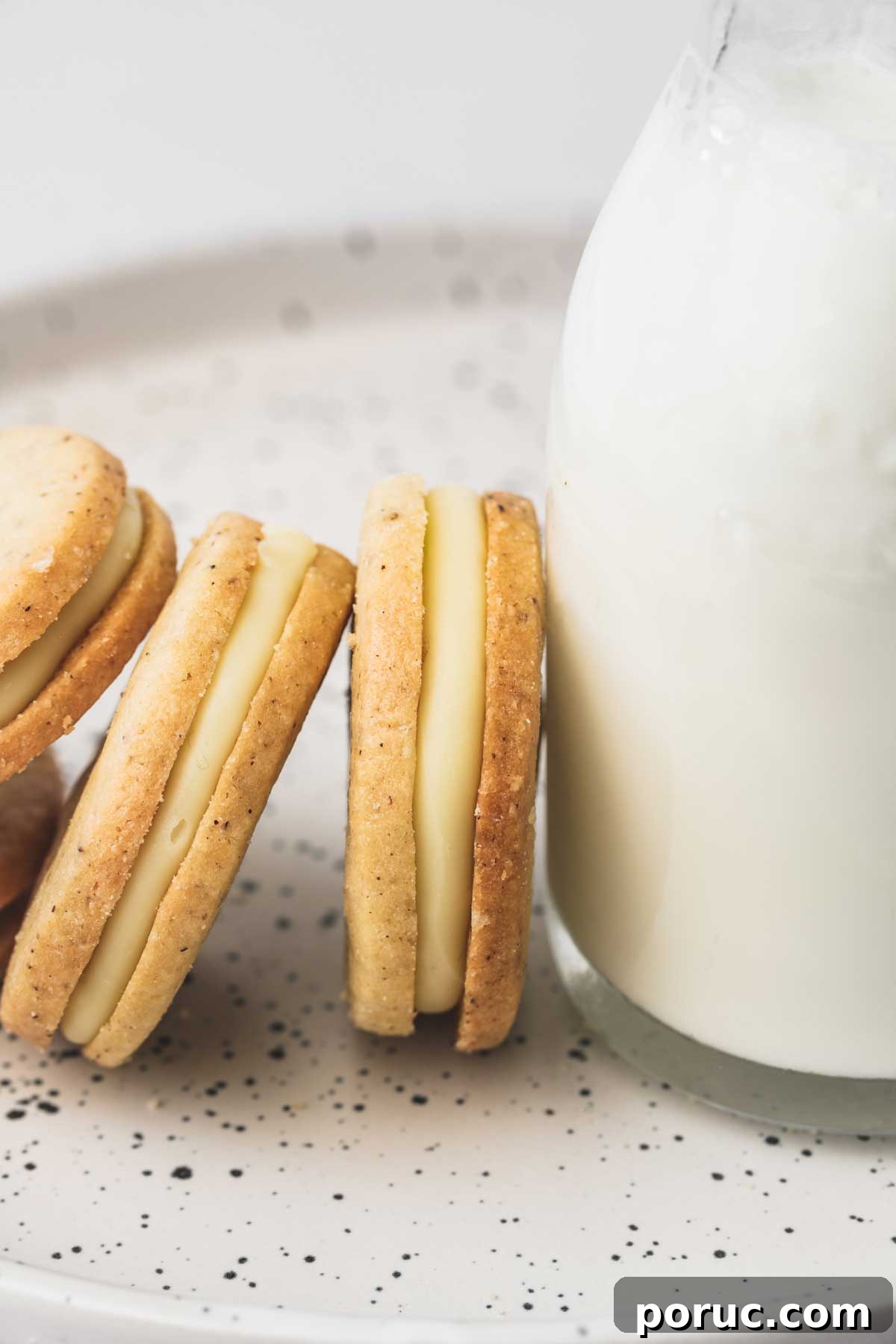 shortbread cookies on a plate with a milk bottle