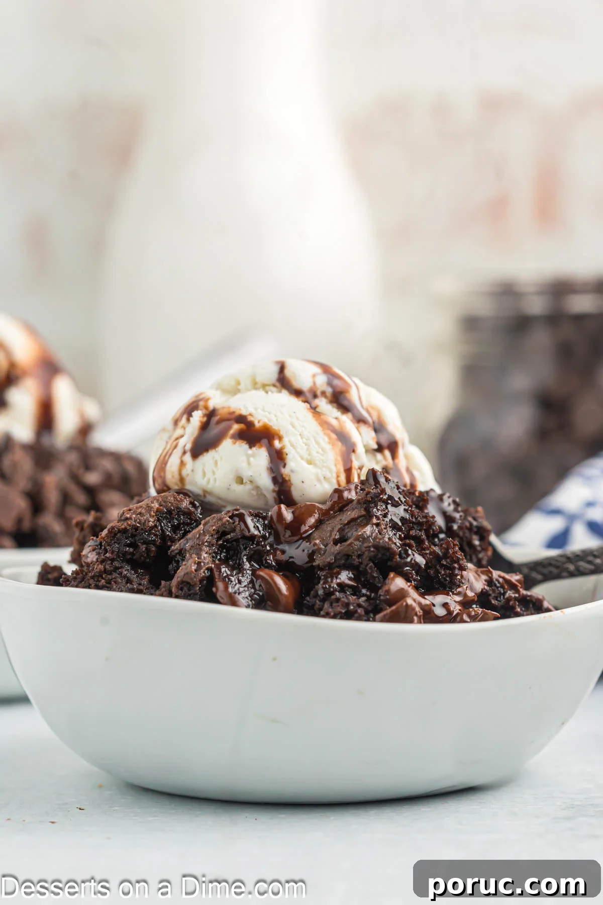 Decadent Chocolate Dump Cake Recipe for Quick Desserts 2 Bowl of cake topped with ice cream.