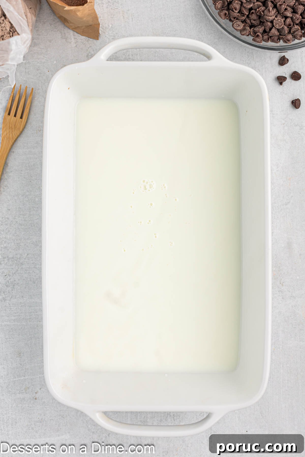 Decadent Chocolate Dump Cake Recipe for Quick Desserts 4 Baking dish with milk.