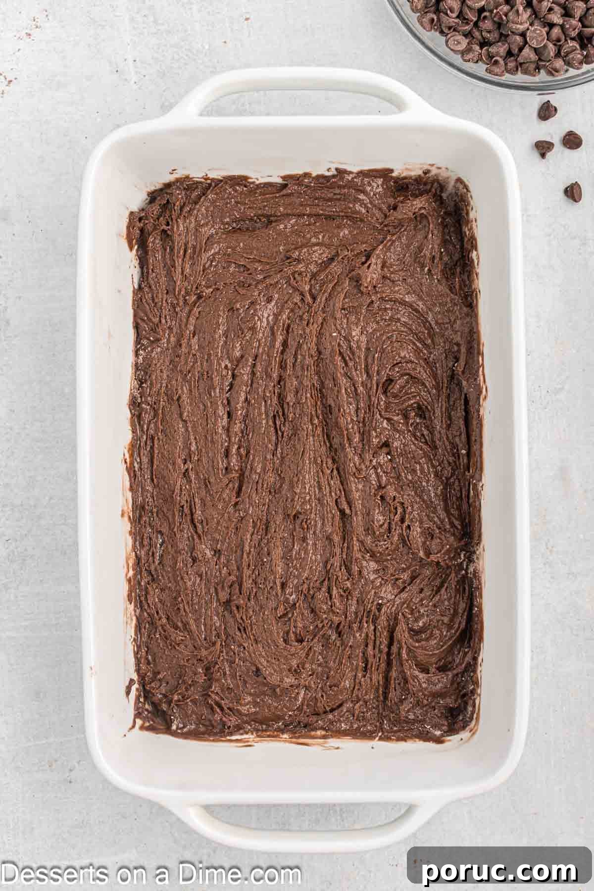 Decadent Chocolate Dump Cake Recipe for Quick Desserts 5 Baking dish with cake mix on top.