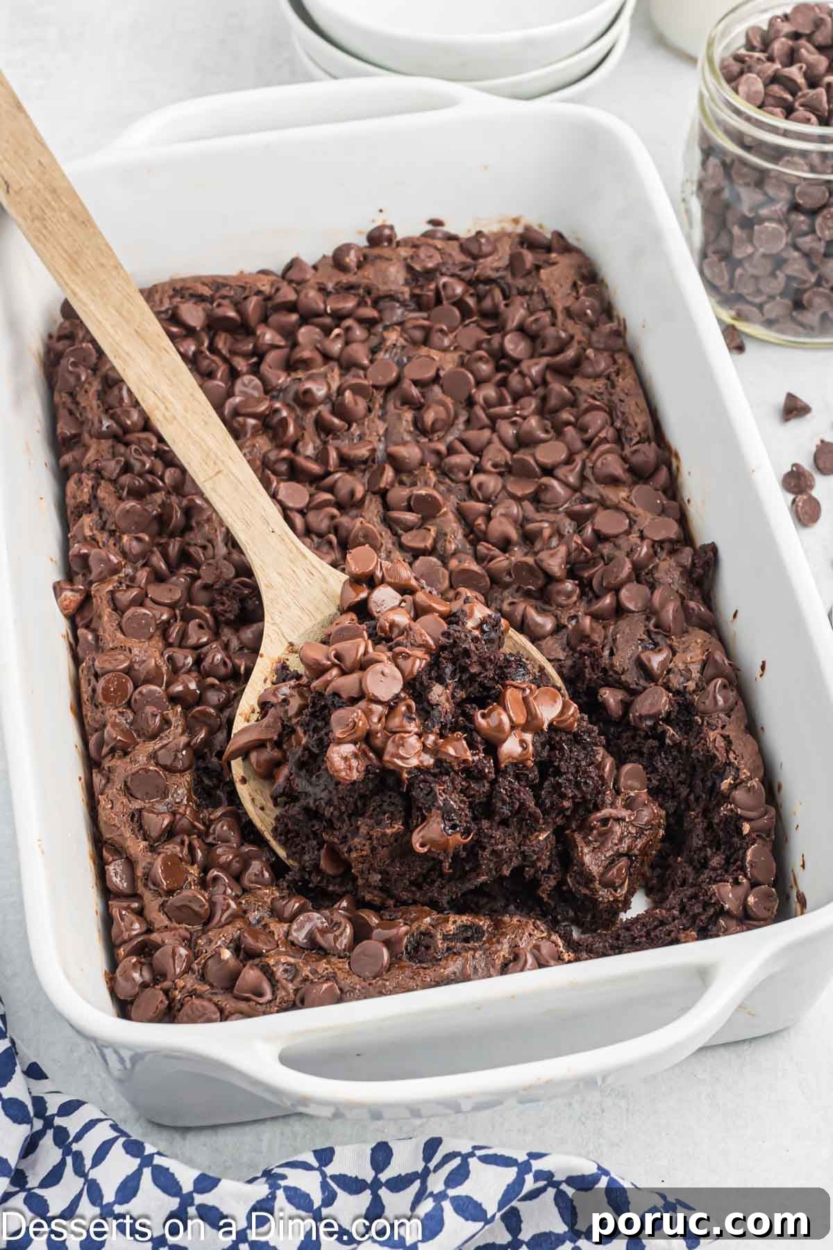 Decadent Chocolate Dump Cake Recipe for Quick Desserts 8 Cake being served with a spoon.