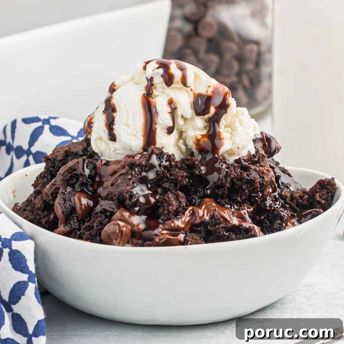 Decadent Chocolate Dump Cake Recipe for Quick Desserts 9 Chocolate dump cake in a bowl with ice cream.