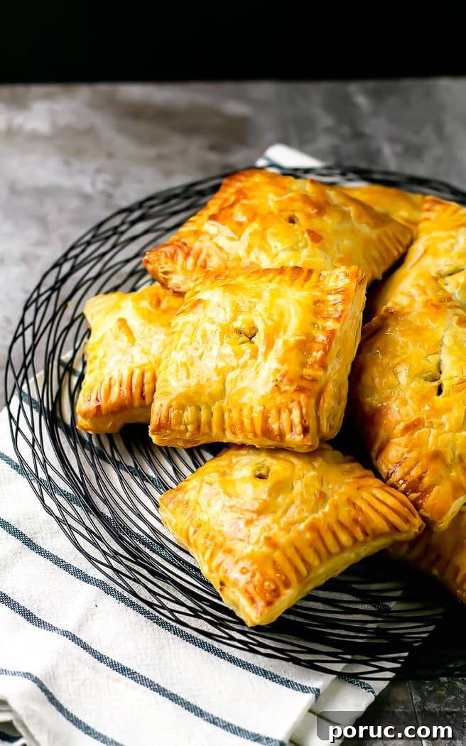 Mini Steak and Ale Hand Pies: Savory Individual Meat Pies 3 wire basket with hand pies
