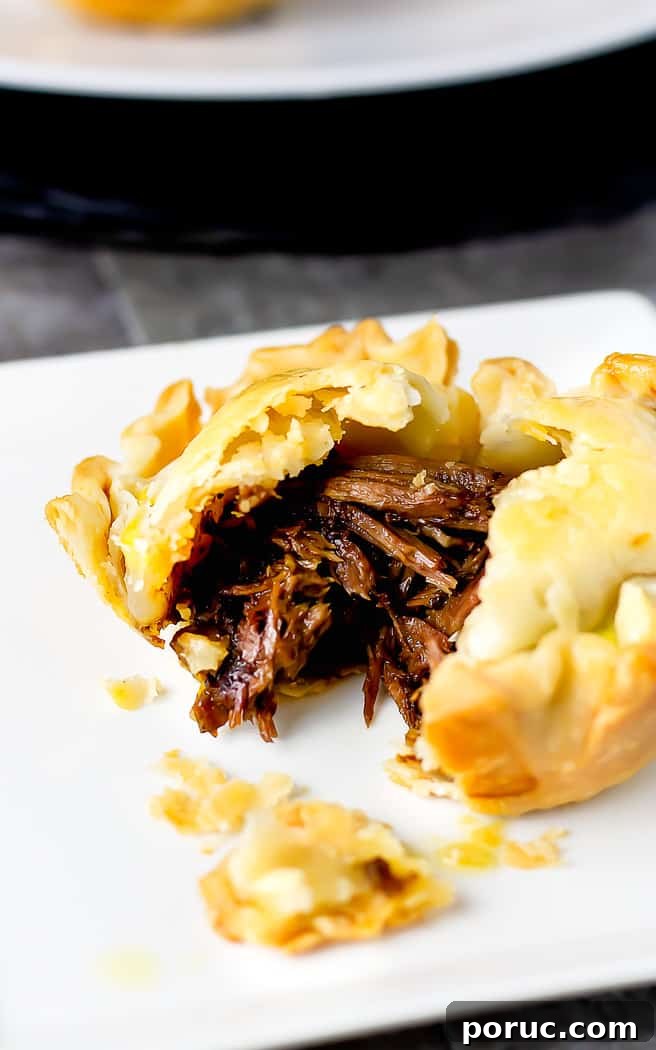 Mini Steak and Ale Hand Pies: Savory Individual Meat Pies 4 close up of mini beef pot pie cut open