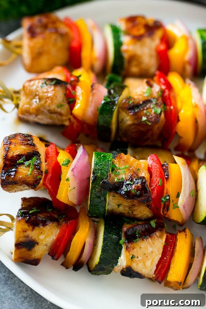 Finished Grilled Chicken Kabobs Grilled chicken kabobs with peppers, onion and zucchini.