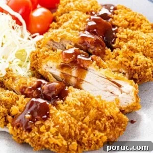 Chicken katsu coated with panko breadcrumbs and topped with katsu sauce.