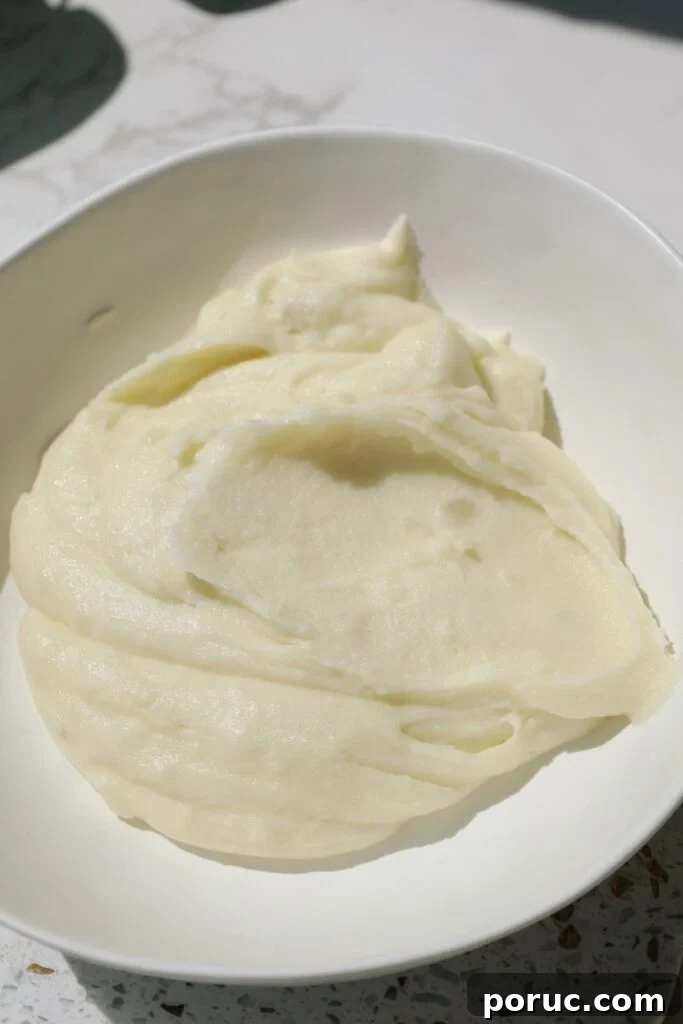 Creamy mashed potatoes in a large plate.