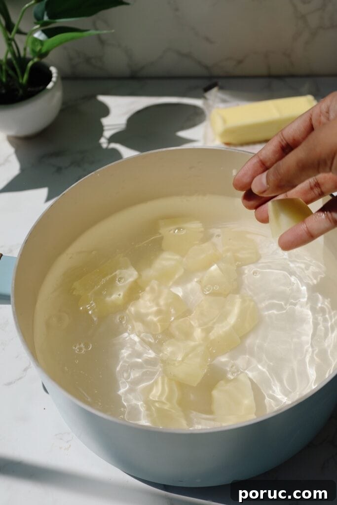 Creamy mashed potatoes step one.
