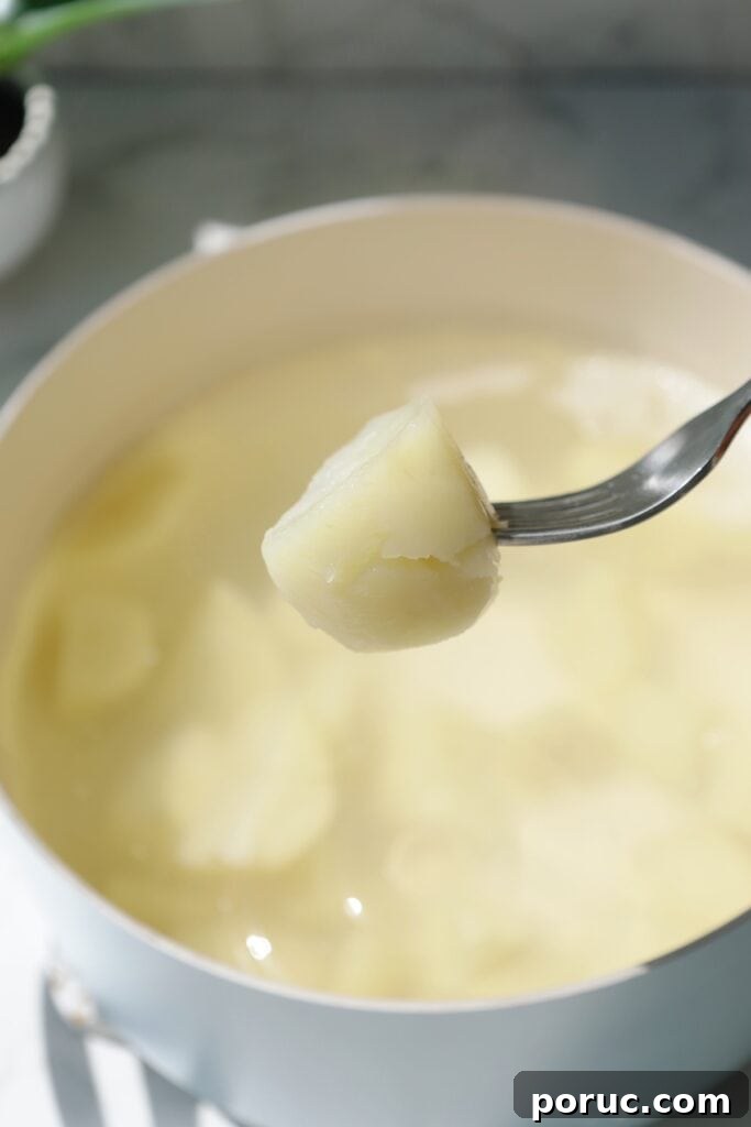Creamy mashed potatoes step two.