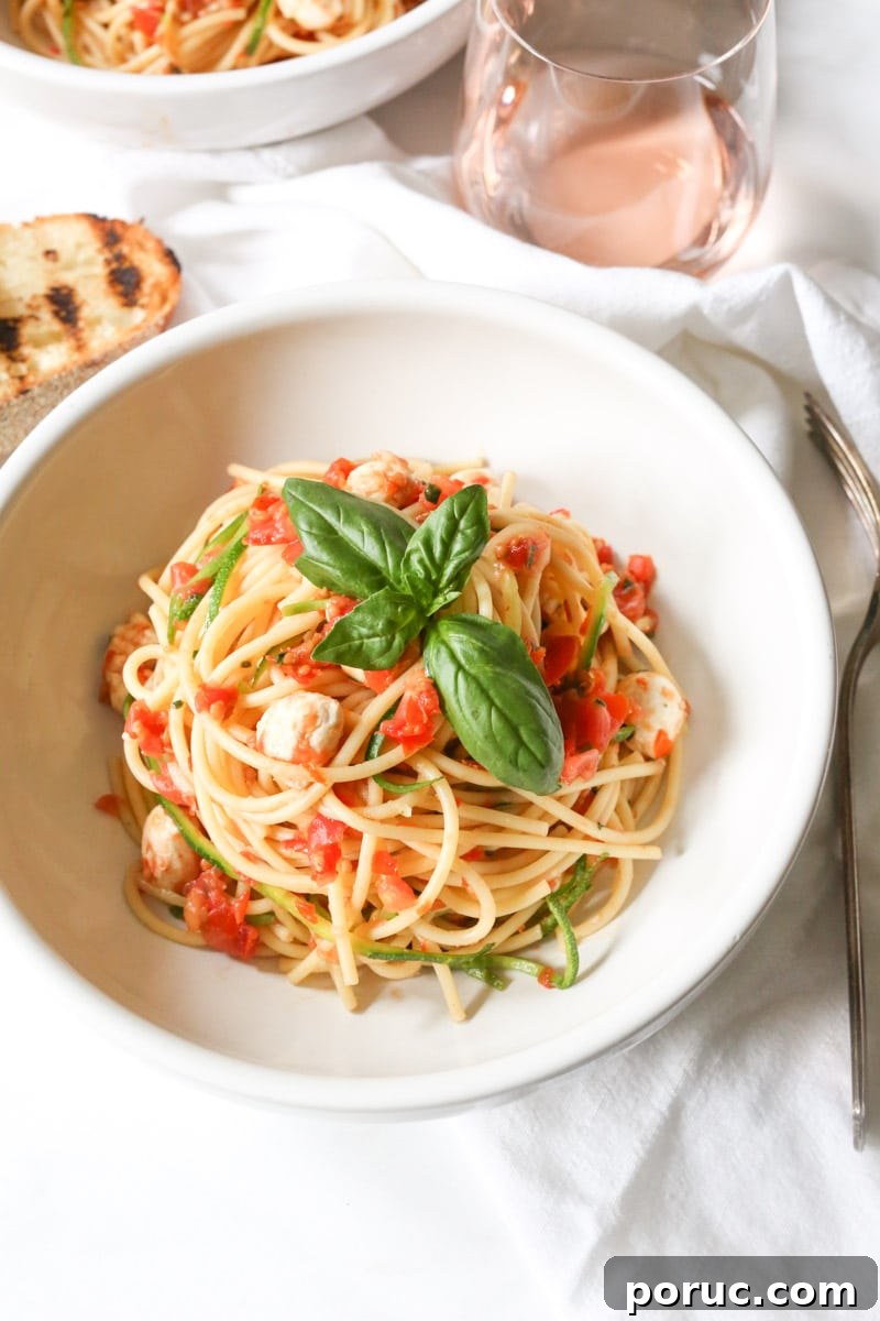 spaghetti-with-zucchini-cherry-tomato-sauce-and-fresh-mozzarella-pearls