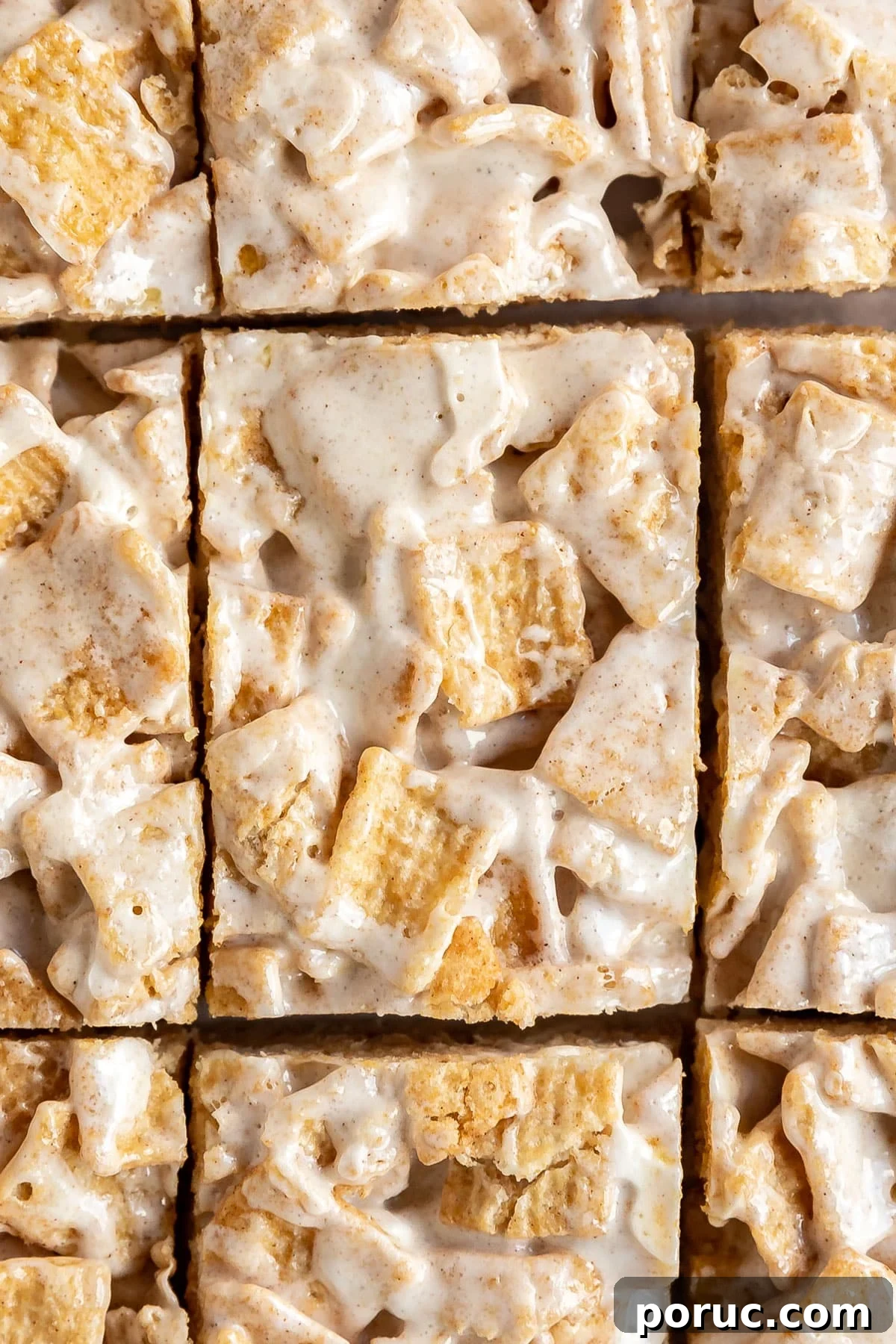 Homemade Cinnamon Toast Crunch Treat Bars Recipe 3 A close up overhead shot of cinnamon treat bars that are cut into pieces.