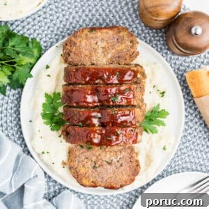 1-Pound Classic Meatloaf Recipe for Moist, Flavorful Results 18 1 pound meatloaf recipe with ketchup on top.