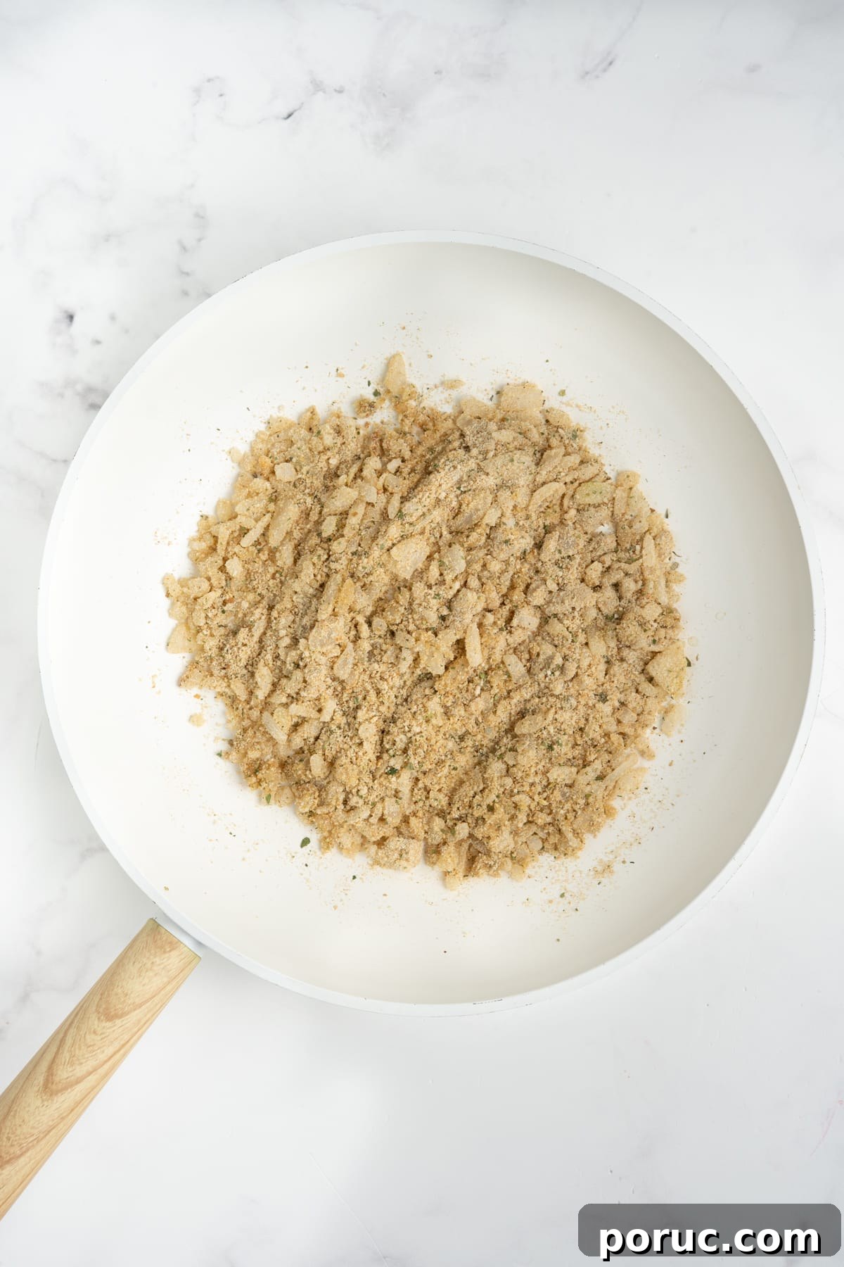 1-Pound Classic Meatloaf Recipe for Moist, Flavorful Results 5 Breadcrumbs added into the skillet.