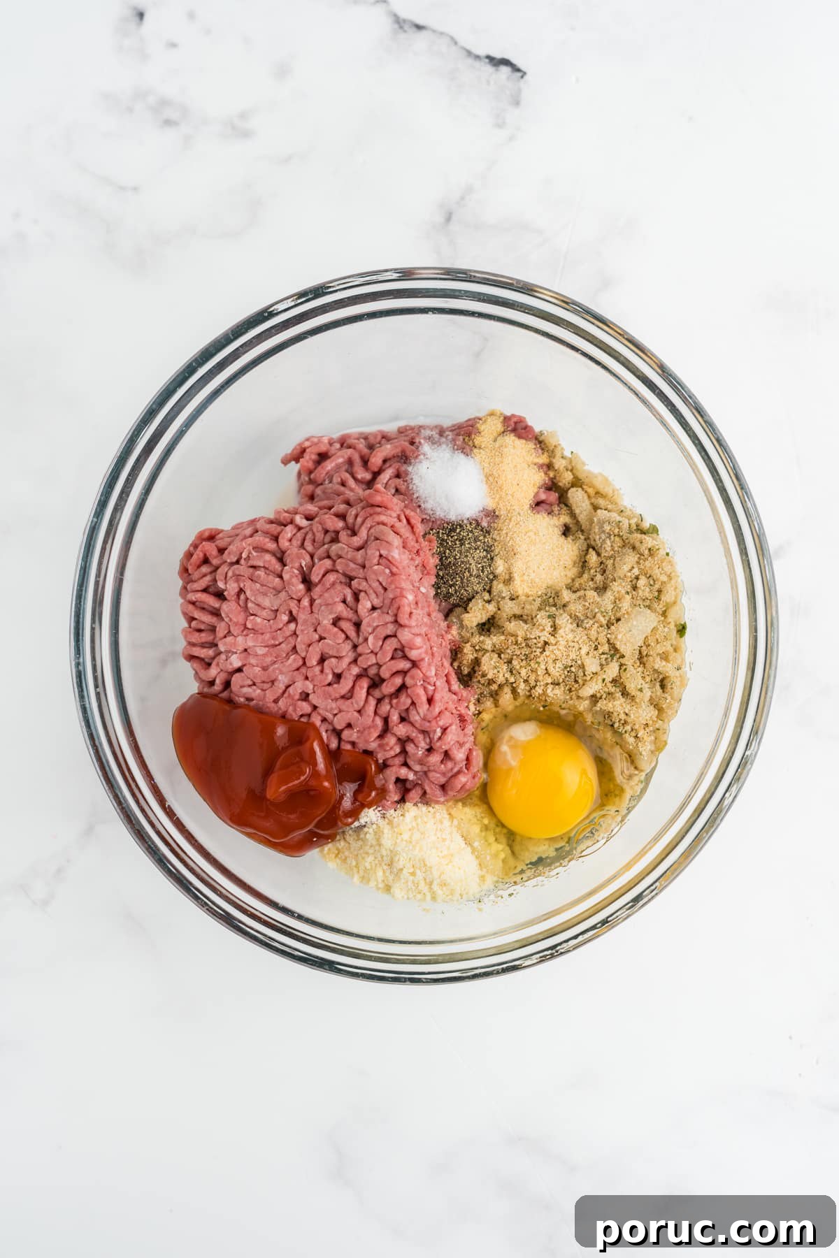 1-Pound Classic Meatloaf Recipe for Moist, Flavorful Results 6 The meatloaf ingredients into the bowl.