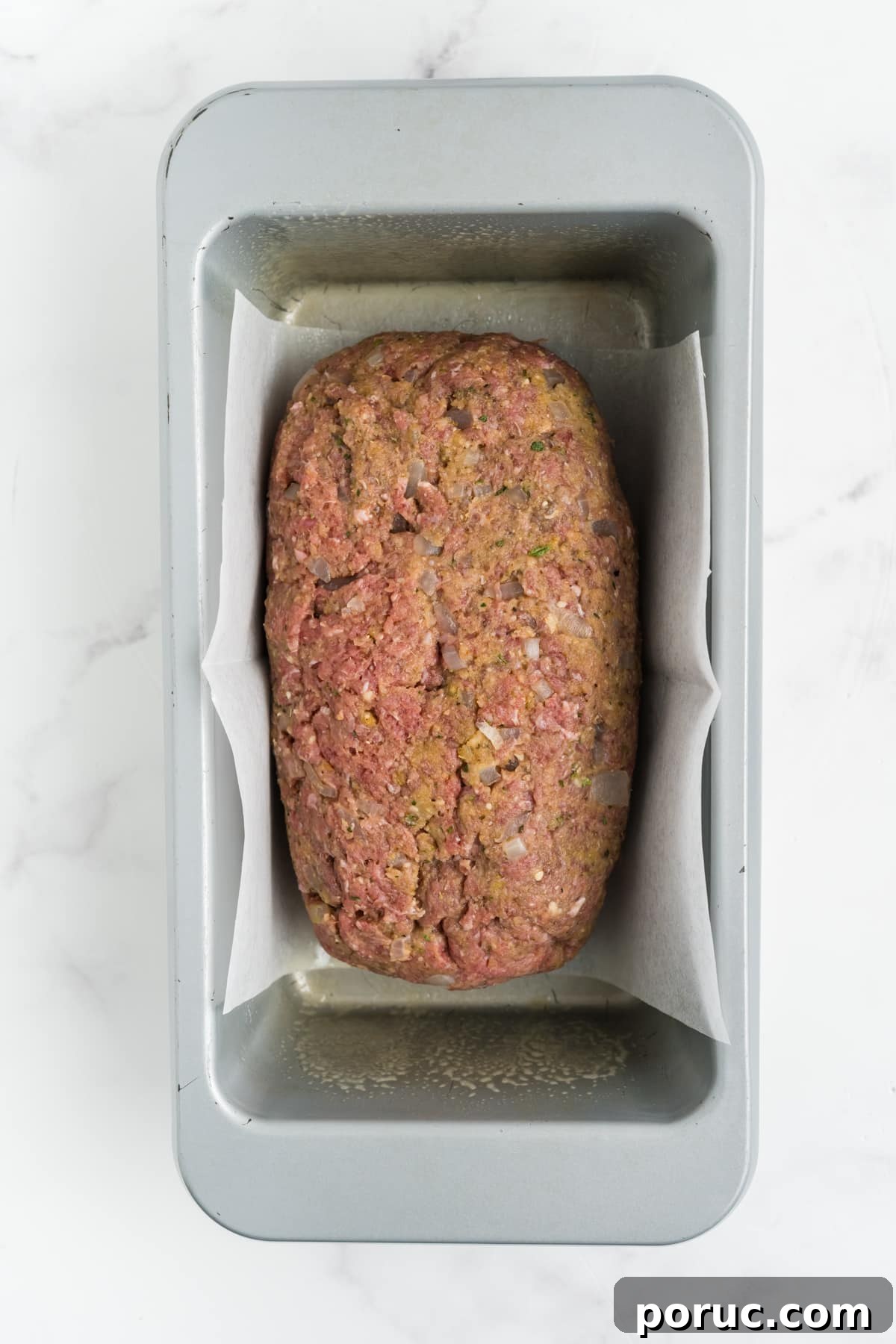 1-Pound Classic Meatloaf Recipe for Moist, Flavorful Results 8 The meat mixture in a loaf pan.