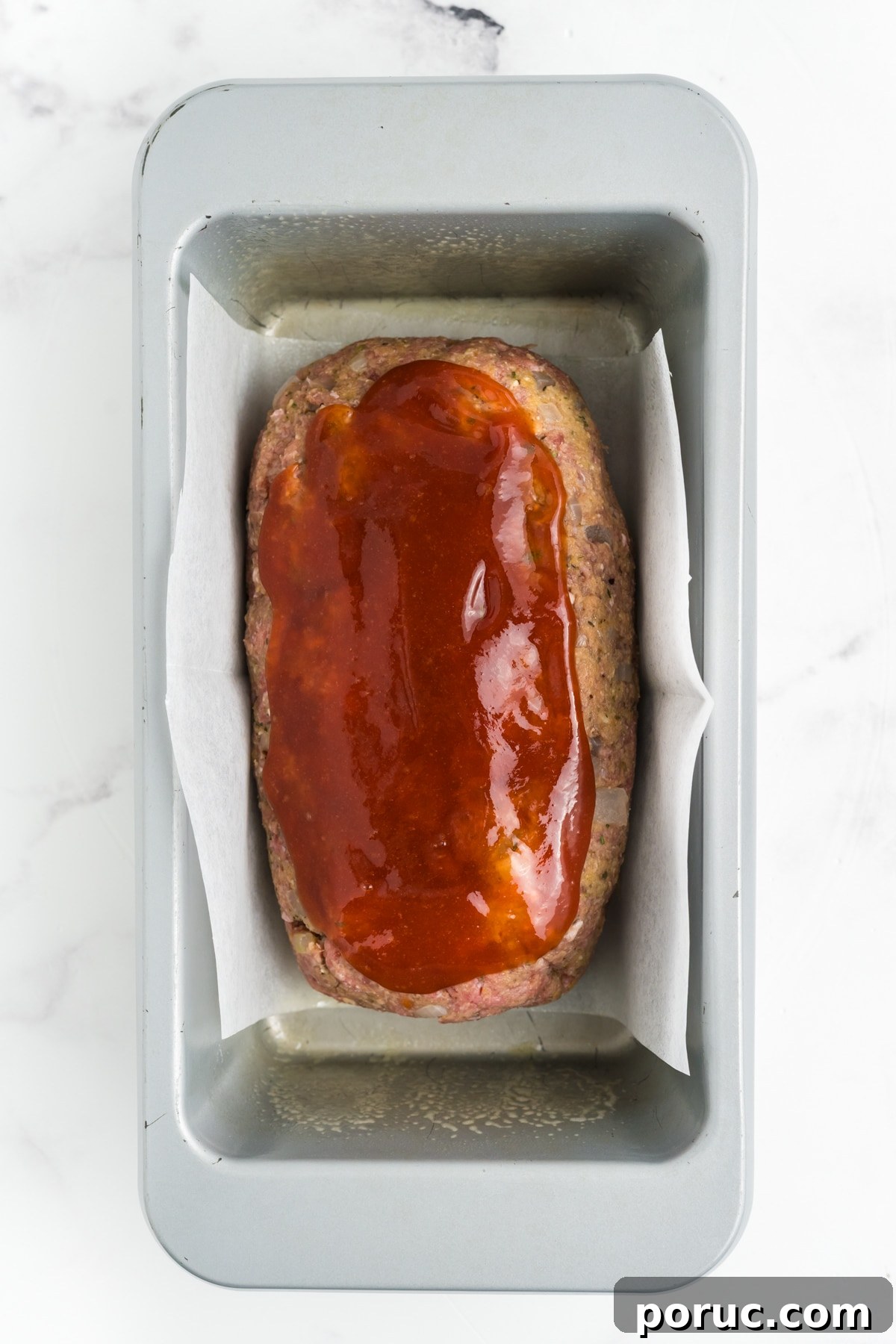 1-Pound Classic Meatloaf Recipe for Moist, Flavorful Results 10 The glaze mixture on the meatloaf.