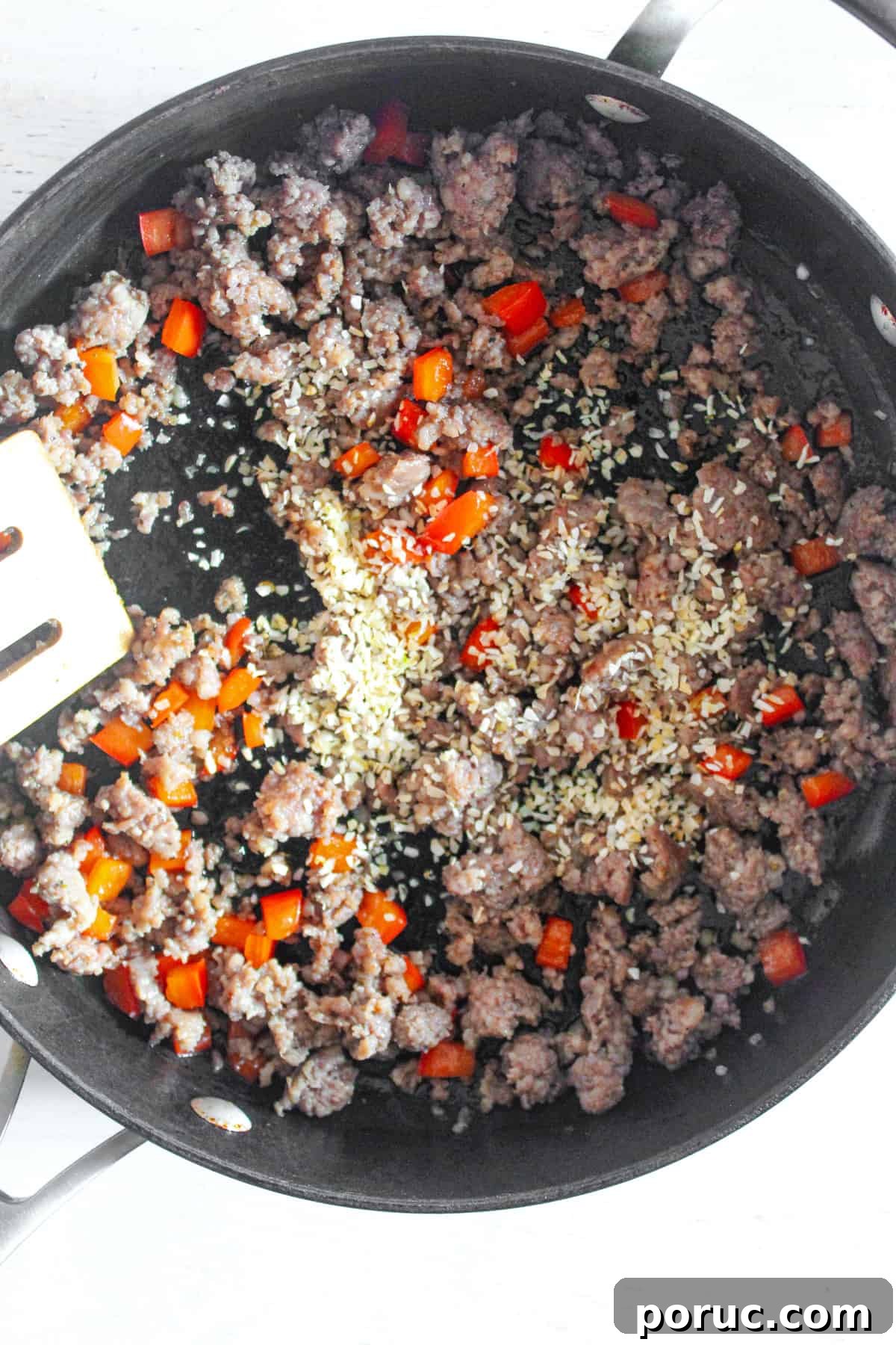 Meatless Gluten-Free Sausage Casserole Recipe for Busy Nights 5 cooked sausage and red pepper in a skillet.
