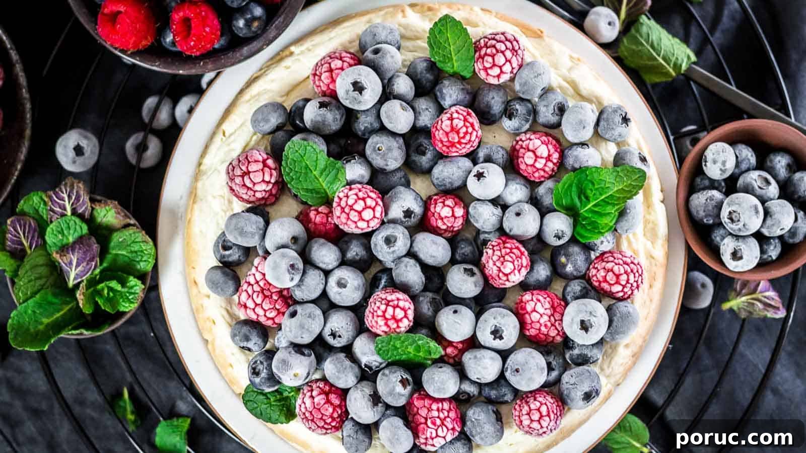 Instant Pot Keto Cheesecake with frozen berries on top.