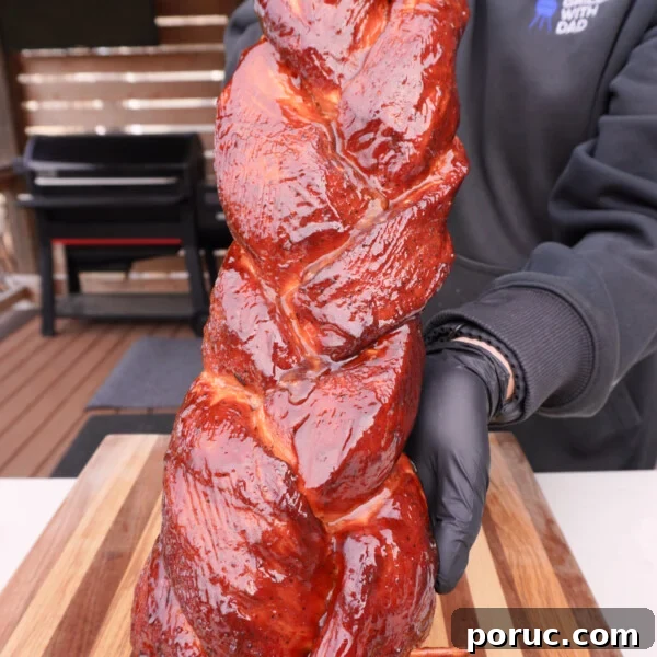 Sweet and Savory Pork Tenderloin Recipe with Glaze and Herbs 10 Braided and saucy pork loin.