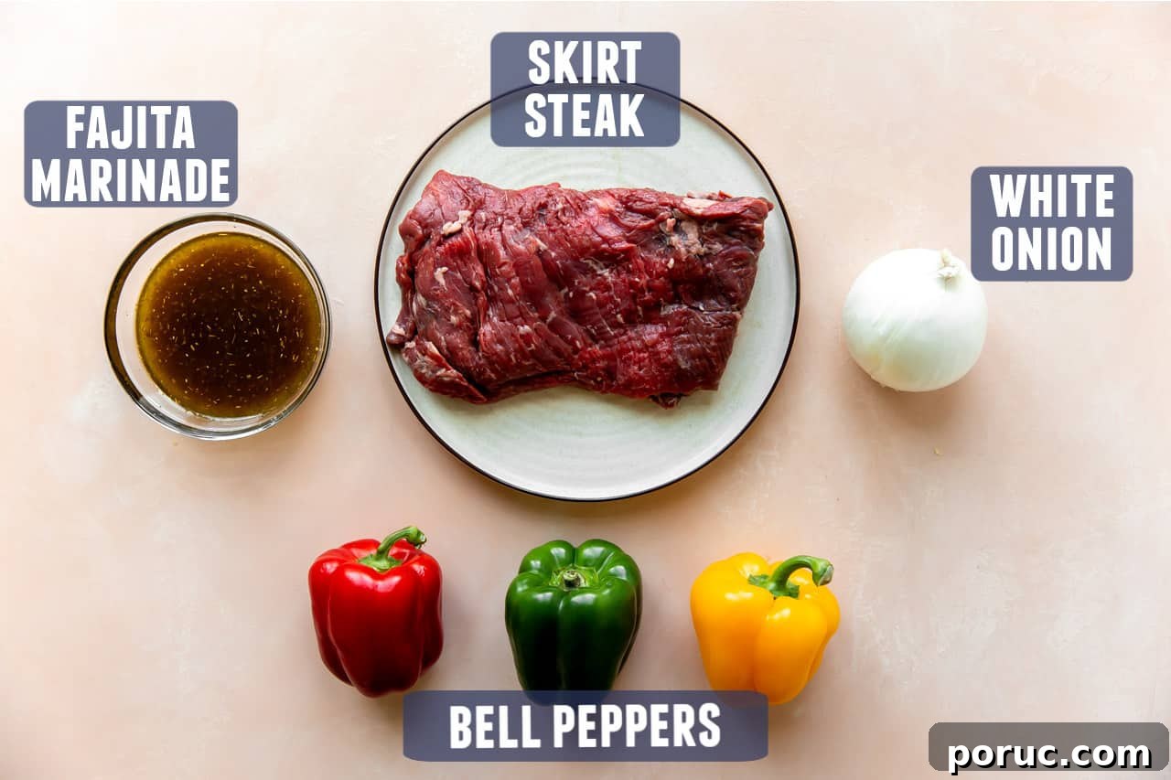 Sizzling Steak Fajitas Recipe with Peppers and Onions 3 Ingredients for steak fajitas laid out on a counter.