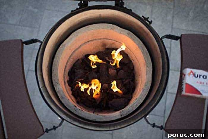Top Kamado Grill Accessories: Rotisserie Kits, Pizza Stones & More 8 coal fire lit and burning in kamado ceramic grill