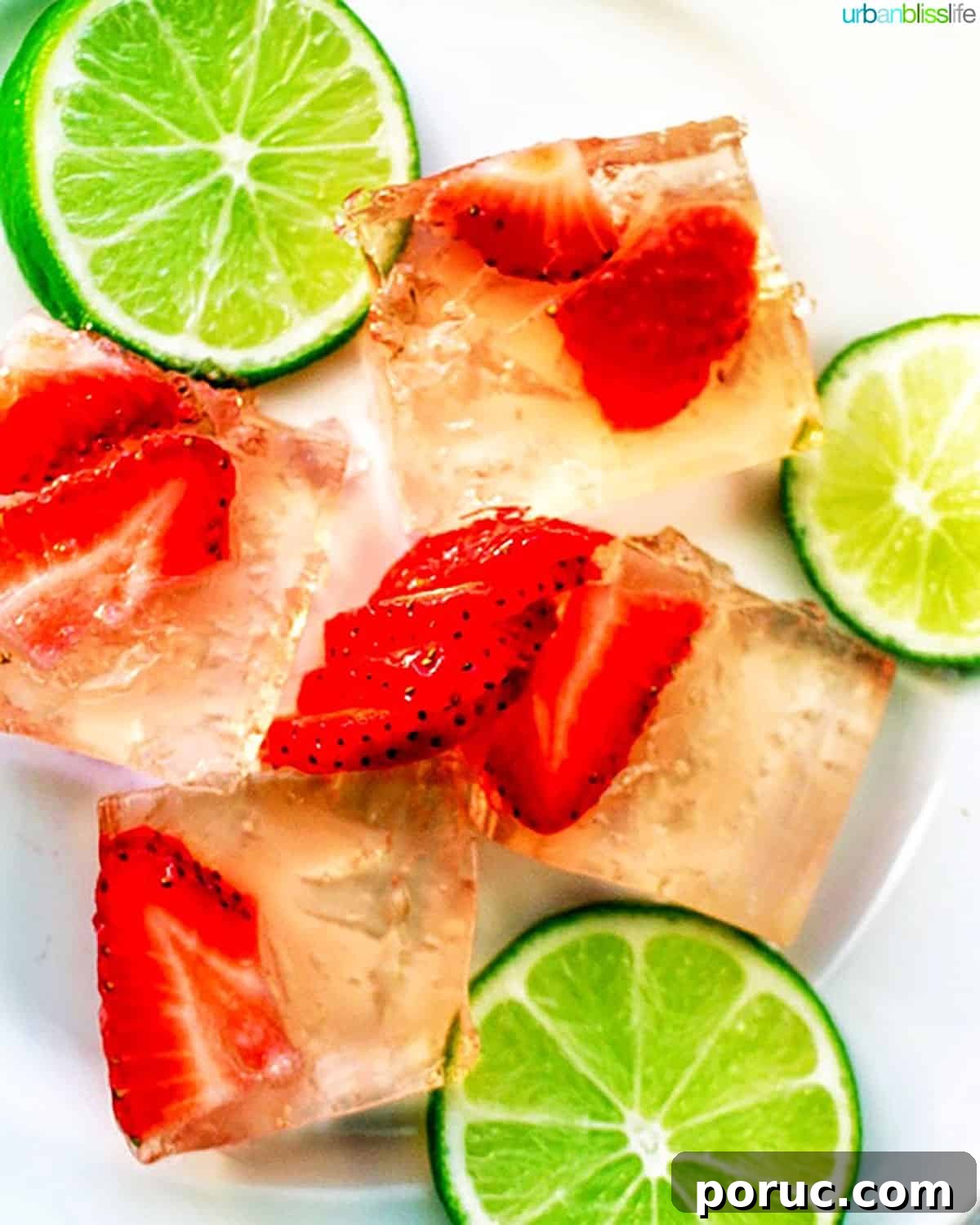 Strawberry Jello Shots Recipe: How to Make Festive Party Shots 2 Strawberry Jello Shots with lime