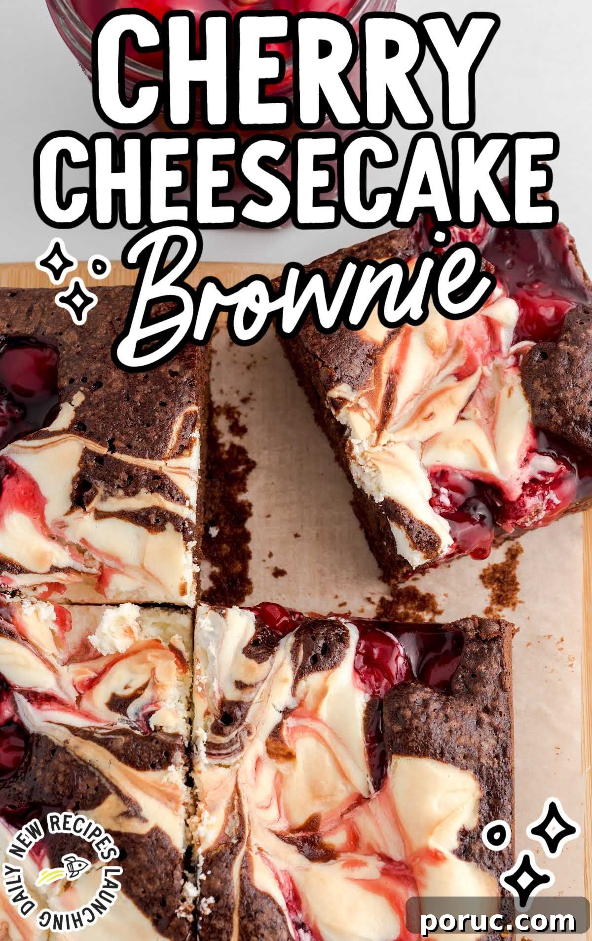 close up overhead shot of Cherry Cheesecake Brownie on a wooden board