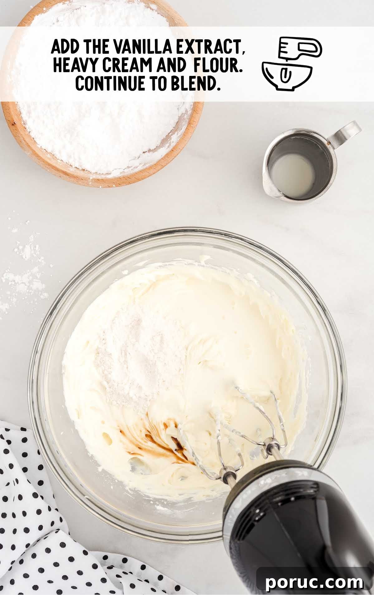 vanilla extract, heavy cream, and flour  added to the cream cheese mixture 