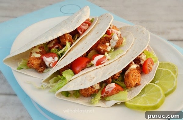 Mildly spiced chicken nuggets in soft tacos with a zesty lime dressing Chicken Nugget Tacos with Lime Dressing