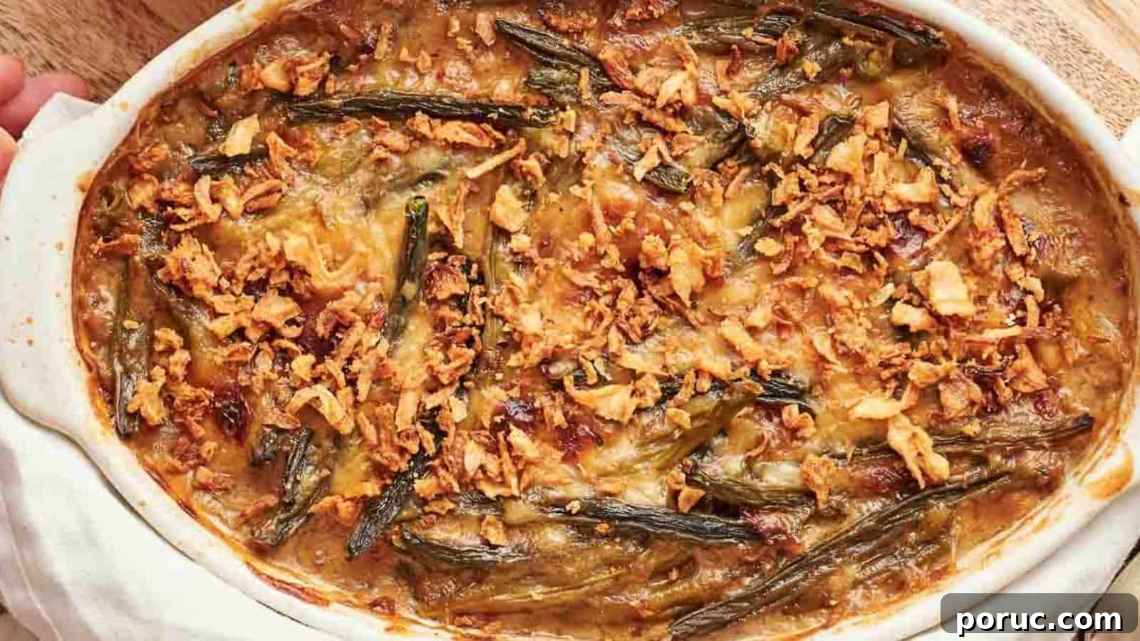 29 Air Fryer Casseroles Perfect for Busy Weeknight Dinners 30 A white dish with green bean casserole in it.