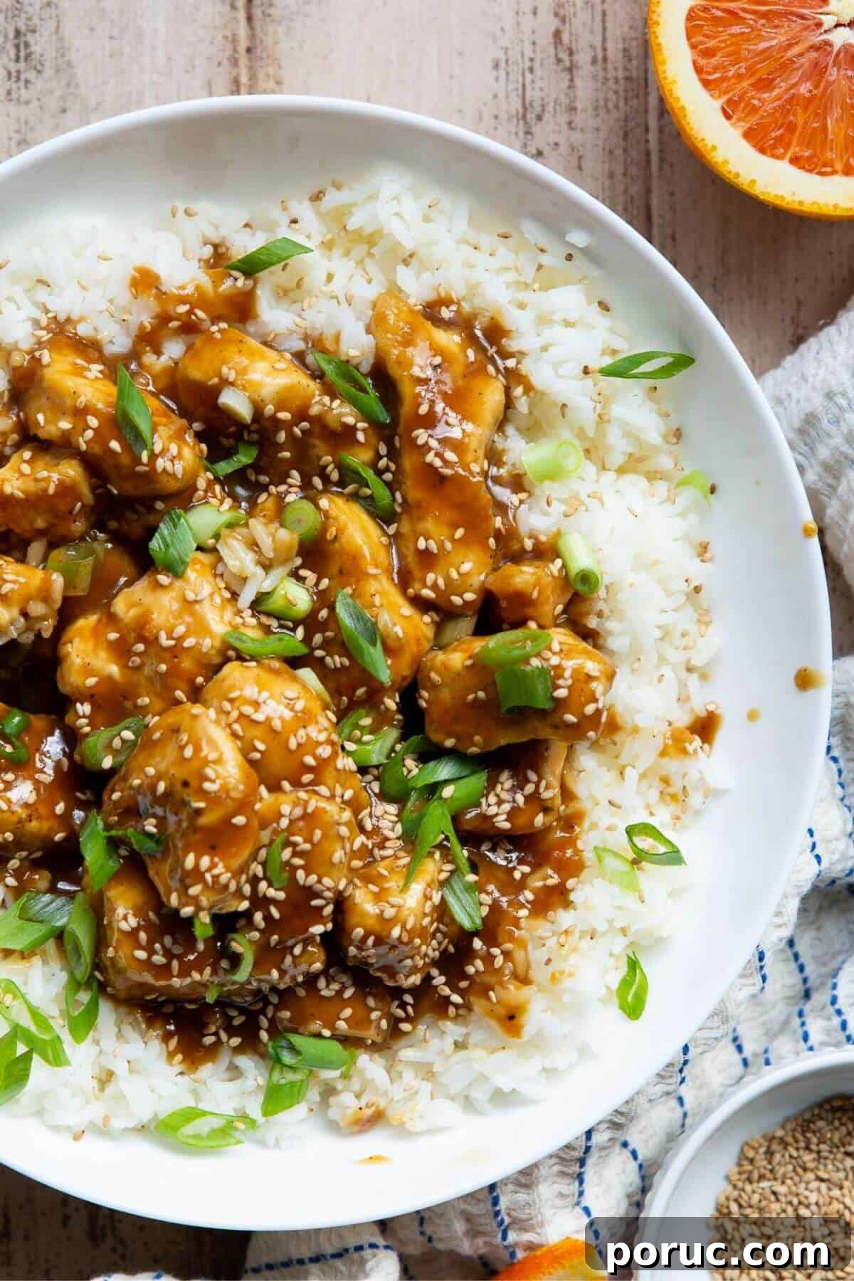 Crispy Air Fryer Orange Chicken Recipe You’ll Love 12 Crispy air fryer orange chicken served with white rice.