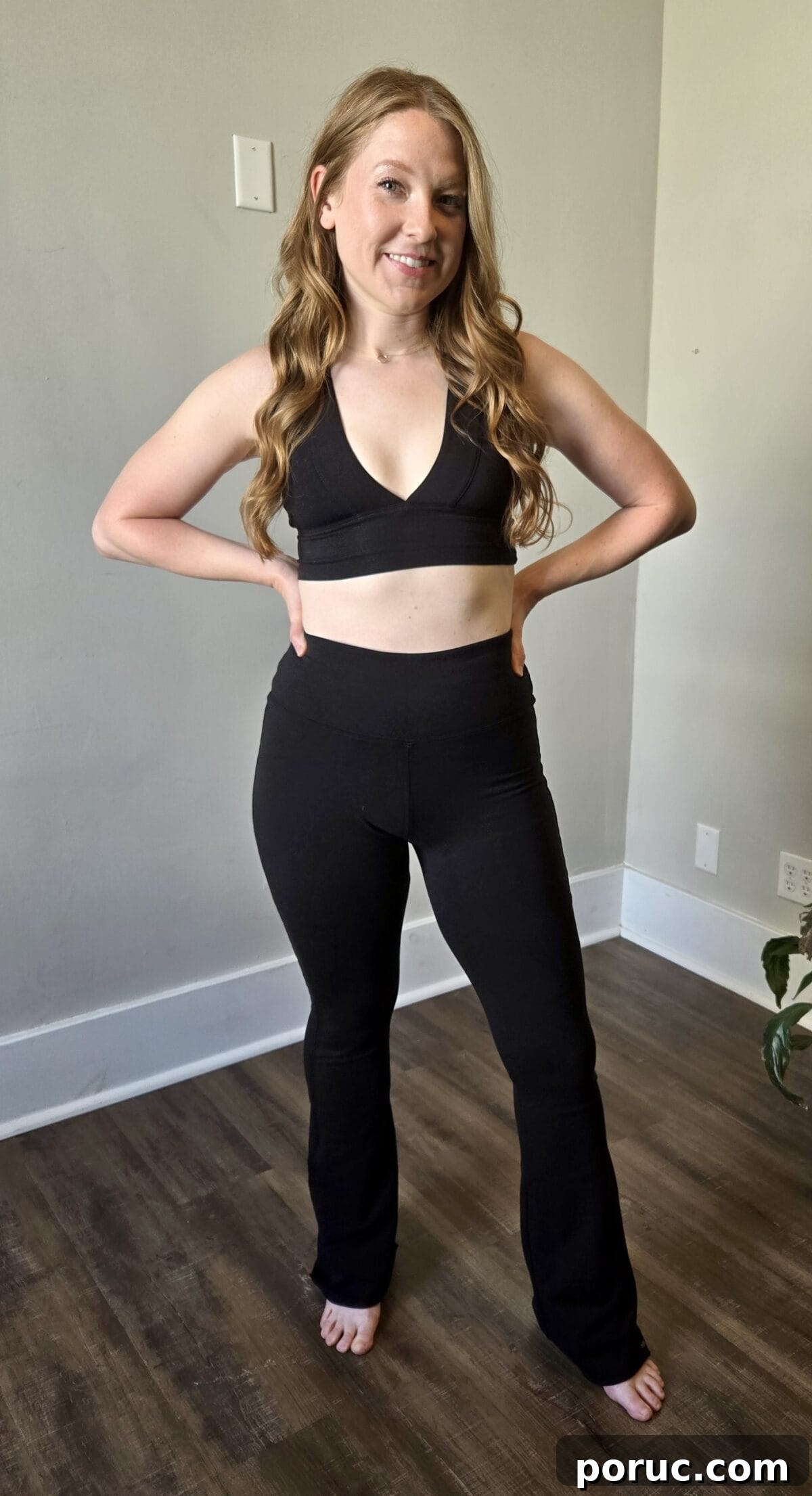 A woman wearing Public Myth high-waisted yoga pants.