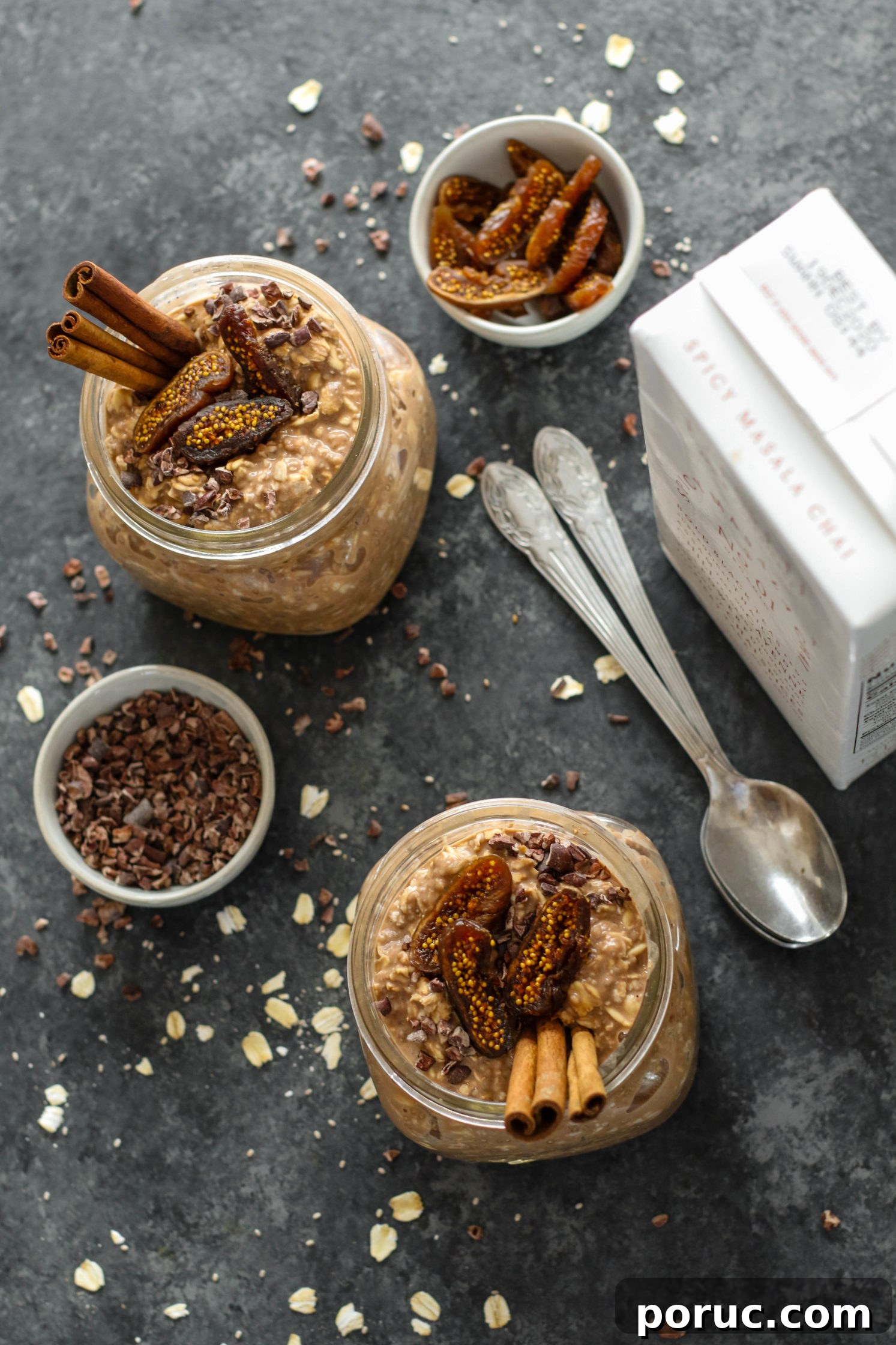 Chocolate Chia Chai Overnight Oats Recipe for Creamy Morning Energy 4 Chocolate Chia Chai Overnight Oats served in mason jars with dried figs, cacao nibs, and cinnamon sticks