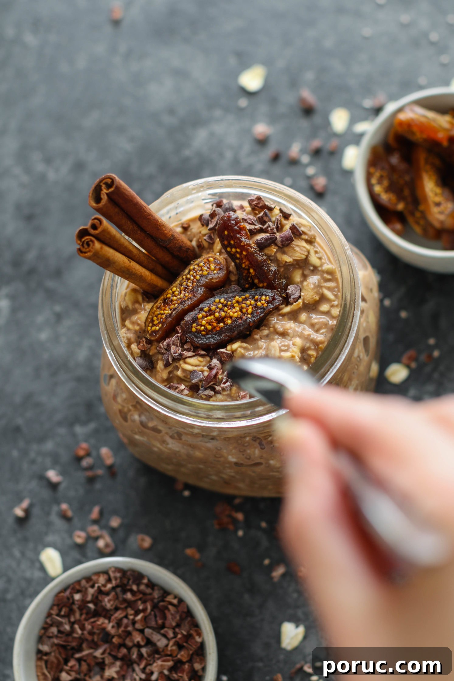 Chocolate Chia Chai Overnight Oats Recipe for Creamy Morning Energy 8 Chocolate Chia Chai Overnight Oats served in mason jars with dried figs, cacao nibs, and cinnamon sticks