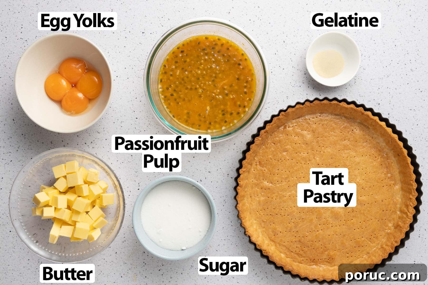 Ingredients laid on a light speckled surface.